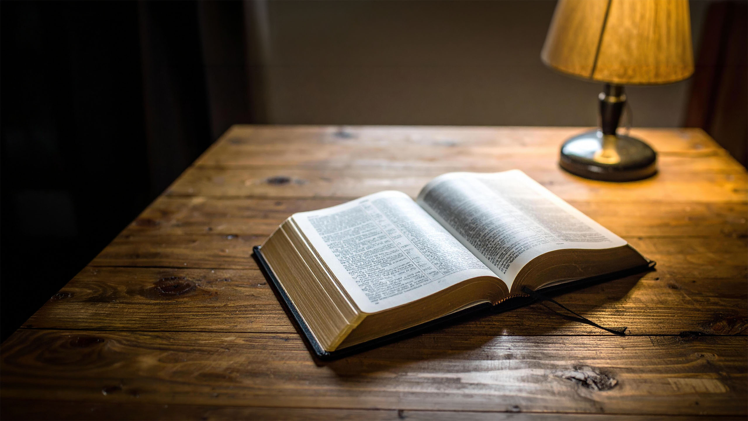 An open bible on a table